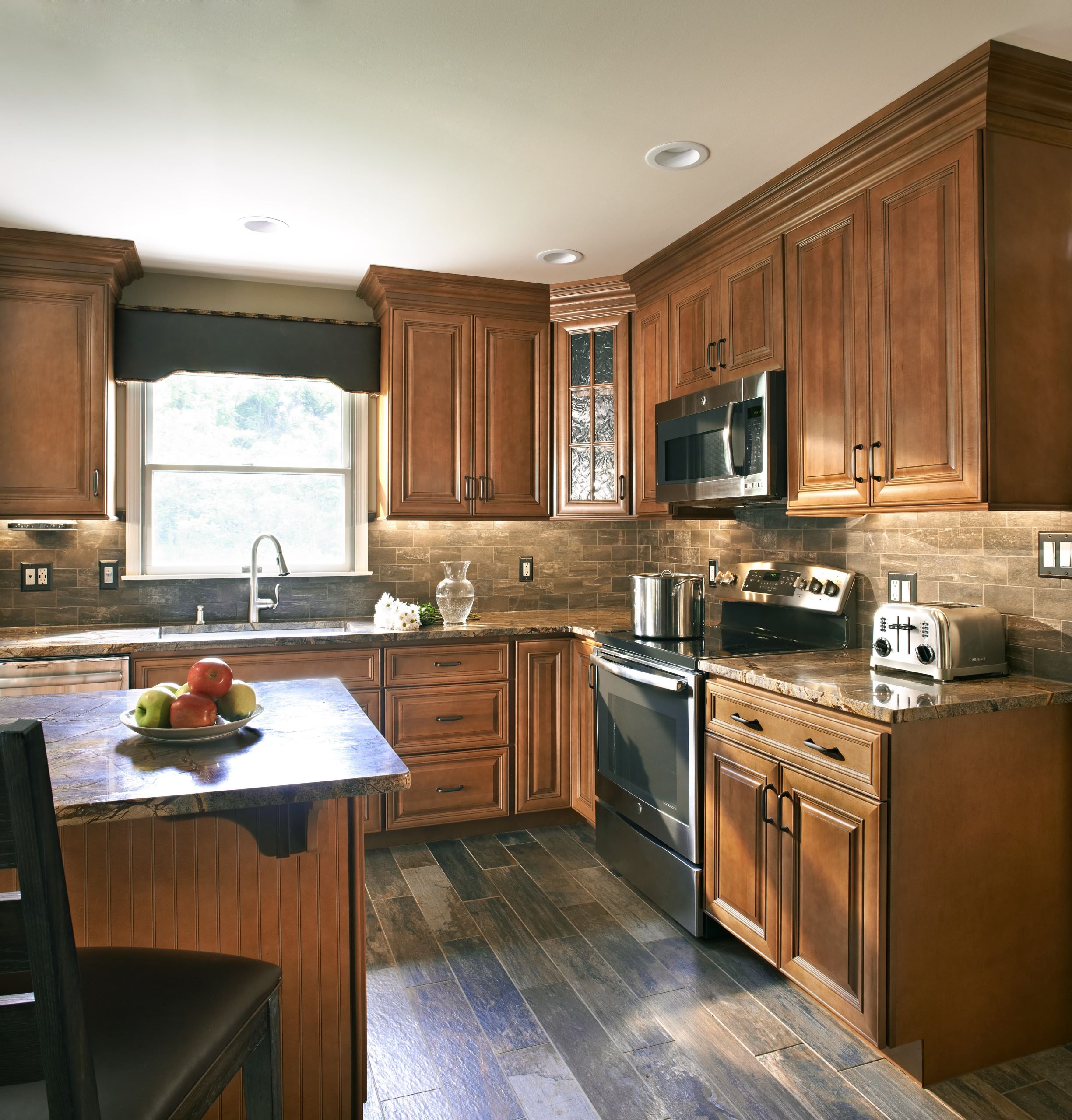 https://www.wolfhomeproducts.com/wp-content/uploads/2023/04/Hudson-Heritage-Brown-Cabinets.jpg